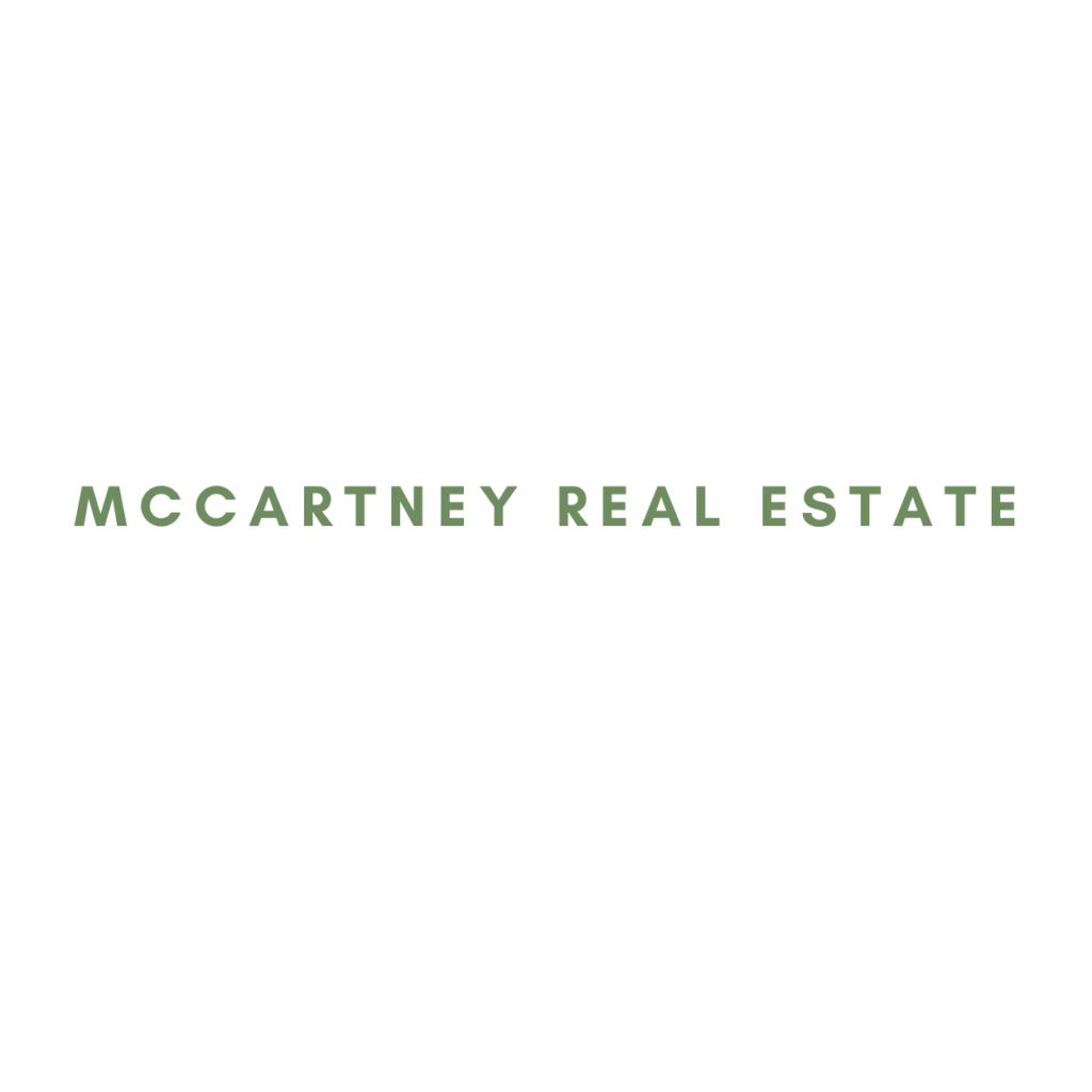 The green Mccartney real estate Logo