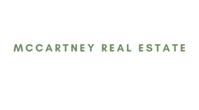 The green Mccartney real estate Logo